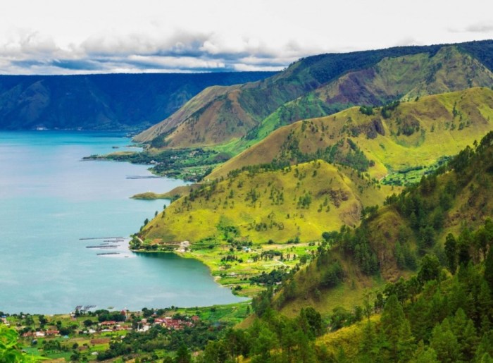 Toba lake sumatra waterfall plunges into indonesia swimming swim underneath refreshing taking
